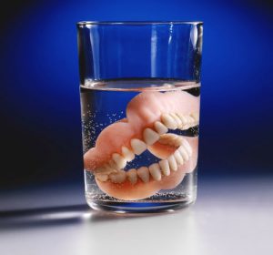 Dentures in a glass